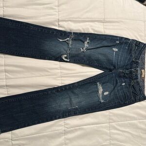 Low rise, wide-legged, ripped Paige Denim jeans, size 25